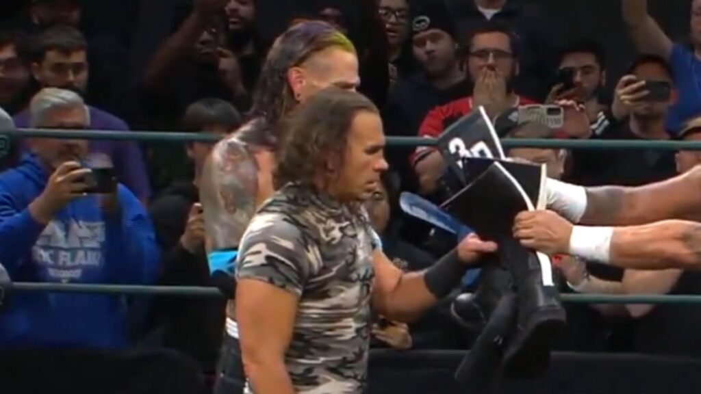 BREAKING: 2 Legends Retire After Final WWE Title Match Against Hardy Boys; Hand Over Their Boots